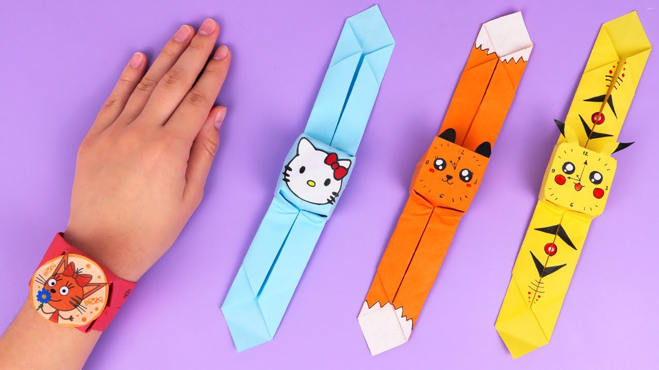 Бумажные поделки самоделки. Браслет для ребенка бумажный. Оригами браслет. Браслет из бумаги для детей. Часы из бумаги наручные.