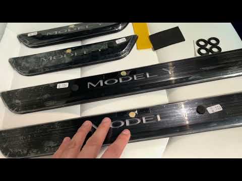 वीडियो: किस टेस्ला मॉडल में गलविंग दरवाजे हैं?