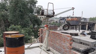 Construction material lifting machine