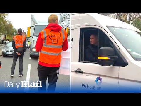 'get a life! ': angry van driver yells at just stop oil protestors blocking road