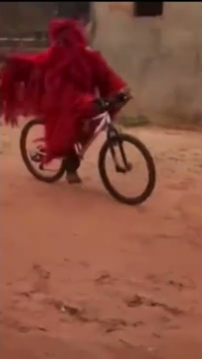 Kankourang riding a bicycle 🤣 these kids aren’t ready #senegal #mandinka #gambia #casamance