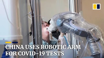 Robotic arm conducts Covid-19 tests as China fights coronavirus flare-up