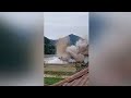 Out of control boats on a flooded river were blown up to protect a power station and dam in China
