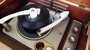 RCA automatic 45 Spindle adapter used to play a stack of 45