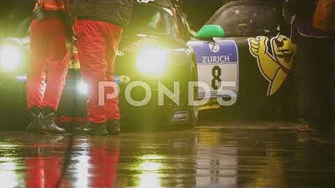 24 Hour Car Racing At Night In Rain - Slow Motion - Racing Track And Pit Stop - 4k Stock Footage