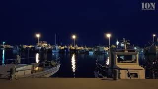 Fishing boats in evening relaxing atmosphere at fishing shelter