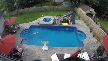 Fiberglass pool install timelapse: part 3 - vacuuming and swimming dog