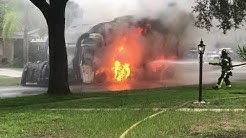 Tampa Firefighters fight a garbage truck fire in Old Carrollwood 