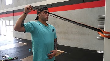 Single arm banded cuban rotation