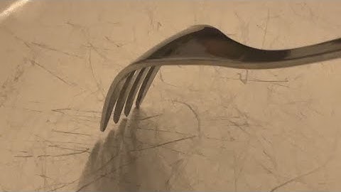 Fork scratching on a plate