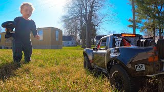 Traxxas Unlimited Desert Racer and my 1 year old as my pit crew 😂