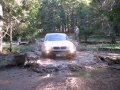 Bmw x3 crossing a puddle