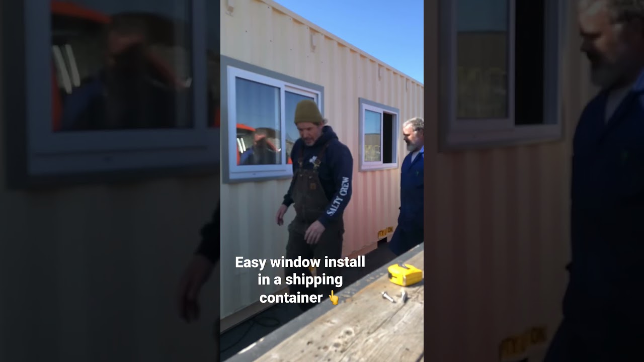 Installing windows in a 40 HC shipping container. HONEYBOX INC. ￼