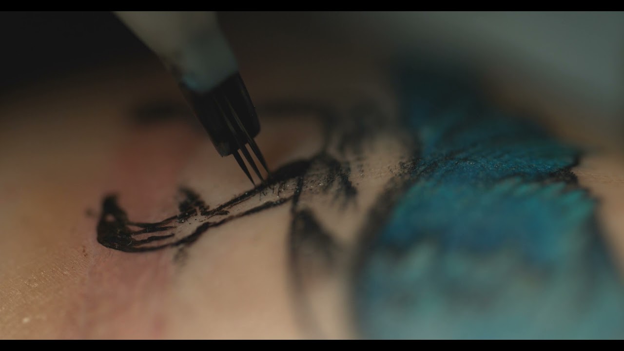 Ink in Motion: Tattoo Needle Shading Up Close in Super Slow motion