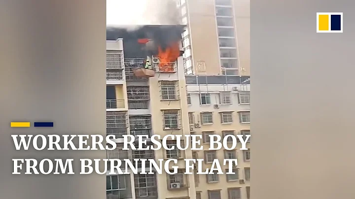 Construction workers use crane to rescue boy from burning flat in China - DayDayNews