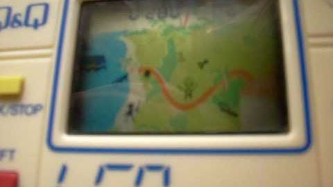 Treasure Island Q&Q handheld lcd game watch