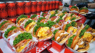 видео: Настолько щедрый, что мясо льется через край! Чизбургер в американском стиле / корейская уличная еда картинка: Настолько щедрый, что мясо льется через край! Чизбургер в американском стиле / корейская уличная еда