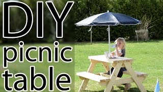 A simple picnic table made of 2x4. Really sturdy. I added a sunshade for that little extra. You can do it in a couple of hours and it is a 