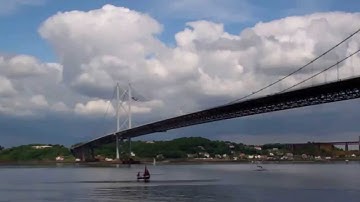 Boat Sailing Under Forth Road Bridge Firth Of Forth Scotland