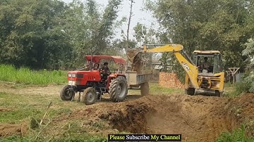 Jcb Machine loading soil in tractors and filling @roadtrendmachinework