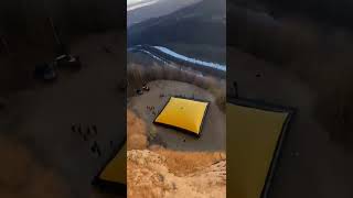 Raw Drone Footage: Cliff Jump Into Airbag 😶 | Looks Too Real | AI Spectrix #shortvideo #shortsfeed