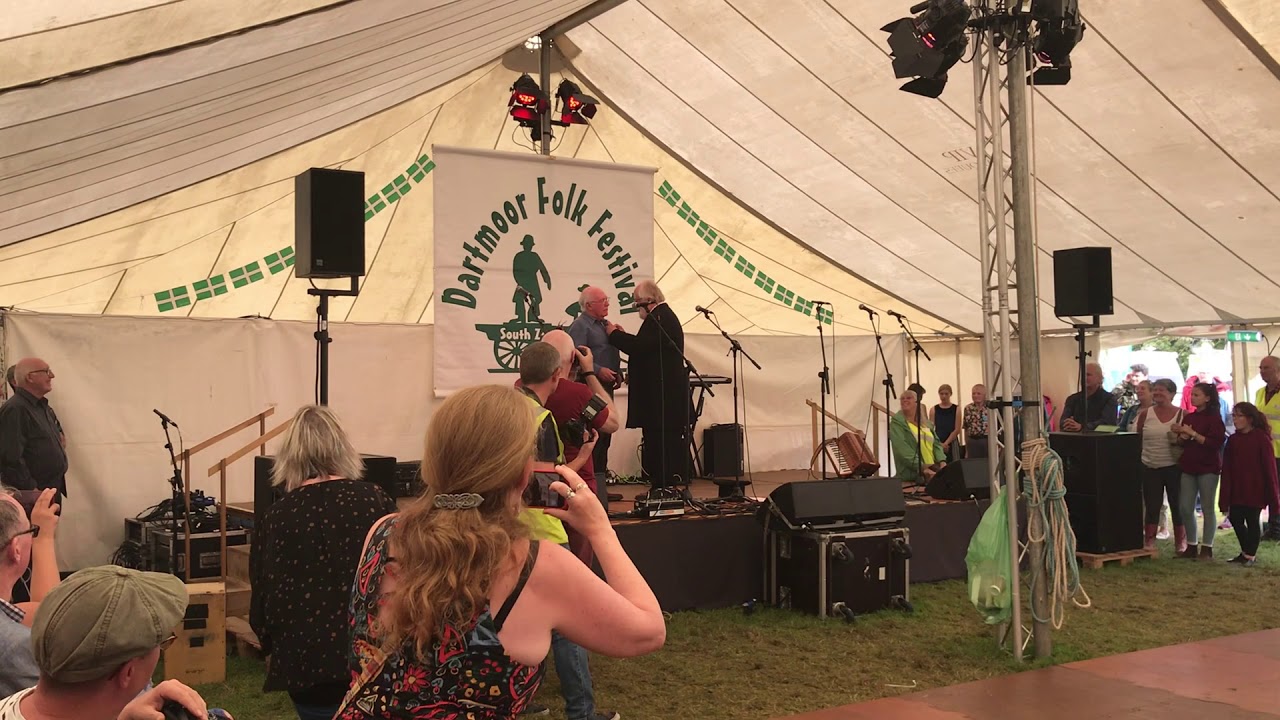 Vic Legg is presented with his EFDSS Gold badge