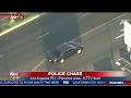 POLICE PURSUIT: LAPD chase a possible gang member in a presumed stolen vehicle