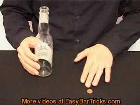 Here's a bar trick that is very hard to do unless you know the secret. Place a small coin on a business card and the business card on a bottle. Now remove the business so that the coin falls into the bottle. business card trick. Unless you know this business card trick it is very hard to figure out. Make a bet and you can win with this business card trick. You can find more bar tricks with business cards at easybartricks.com. You can find this trick at http We have huge collection of bar tricks - all the bar tricks are free and presented in video. Business card Trick.