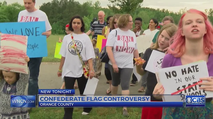 Opponents of Confederate flag in Orange Co. schools march to meeting