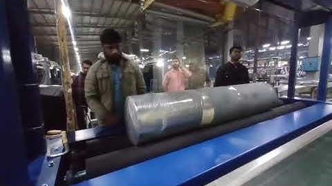 Stretch film packing machine for fabric roll!