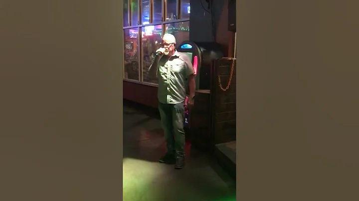 Carl singing Long Hair of a Sinner, Bluffs Karaoke...