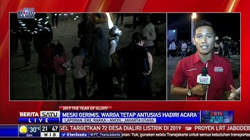 Gerimis Mengguyur Ancol, Warga Tetap Antusias Rayakan Tahun Baru