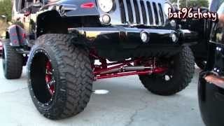Black/Red Jeep Wrangler Unlimited Lifted on 37x13.50r22 Grapplers 