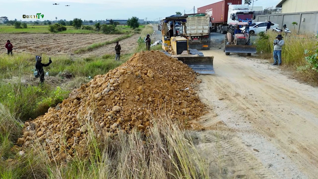 Skilled Operation in Action! KOMATSU Dozer and 6-Wheel Dump Trucks Filling Flooded Land Smoothly