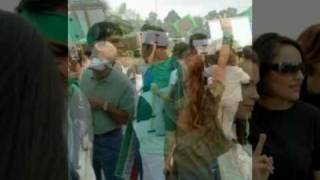 Alyssa Milano & Chris Gorham demonstrating with Iranians Information