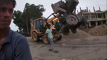 JCB Backhoe Machine Loading Soil in Tractor - JCB Machine Unloading Concrete Mixer From Tractor