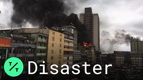 Nigeria Firefighters Battle Balogun Market Fire in Lagos