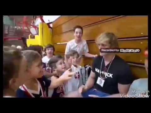 Logan paul with a Dwarf fail handshake