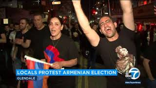 Thousands of armenians marched in glendale sunday night to protest the
election results their native land.