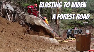 Blasting rock in road works