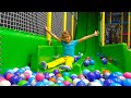 Yaroslava plays in the Indoor Kids Center - Climbing, Spinning and Creative Building Video for kids