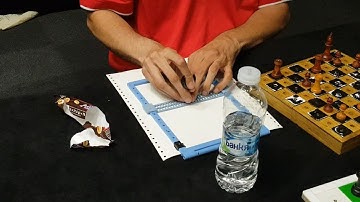 How do the blind players write their scoresheets?