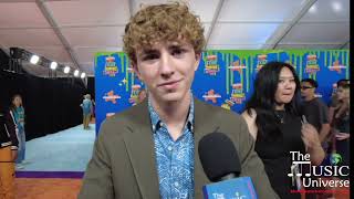 Walker Scobell of Percy Jackson on the 2024 Kids Choice Awards Orange Carpet