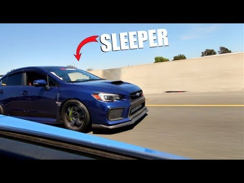 sleeper-800hp-subaru-sti-vs.-800hp-evo-x!-(-comparison-)