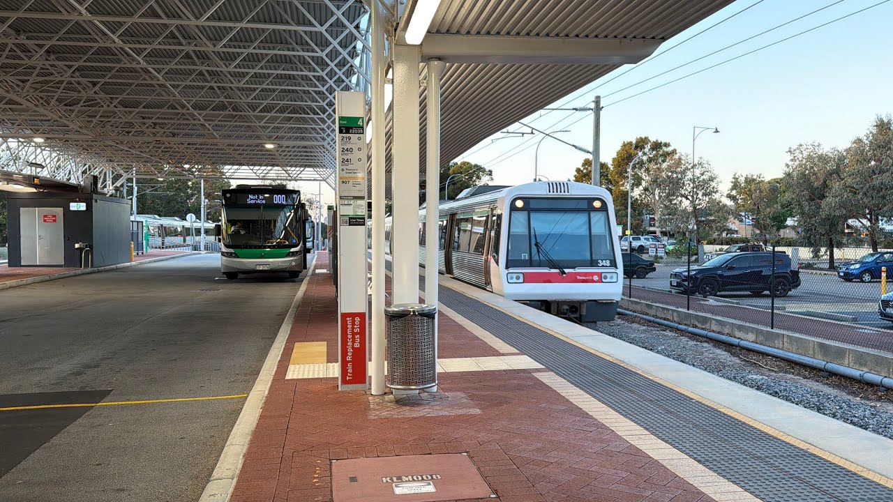 Trains and a few buses at Kelmscott station