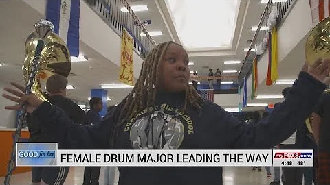 Cummings High School drum major leads marching band