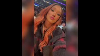 Candice patton watches the basketball game #139
