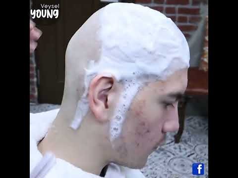 the buzzcut - the boy is shaving all his hair