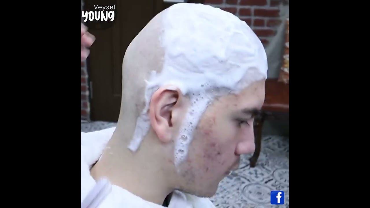 the buzzcut - the boy is shaving all his hair