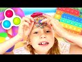 Nastya and her friends play with pop it toys